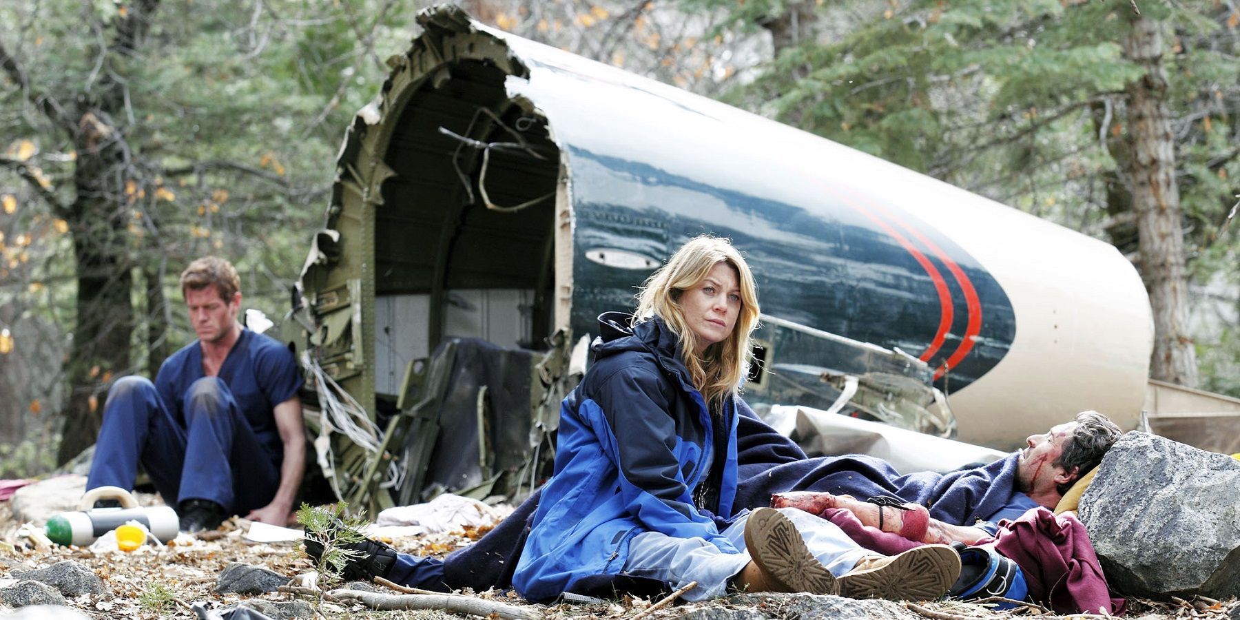 Eric Dane, Ellen Pompeo, and Patrick Dempsey as Mark, Meredith, and Derek in Grey's Anatomy after a plane crash.