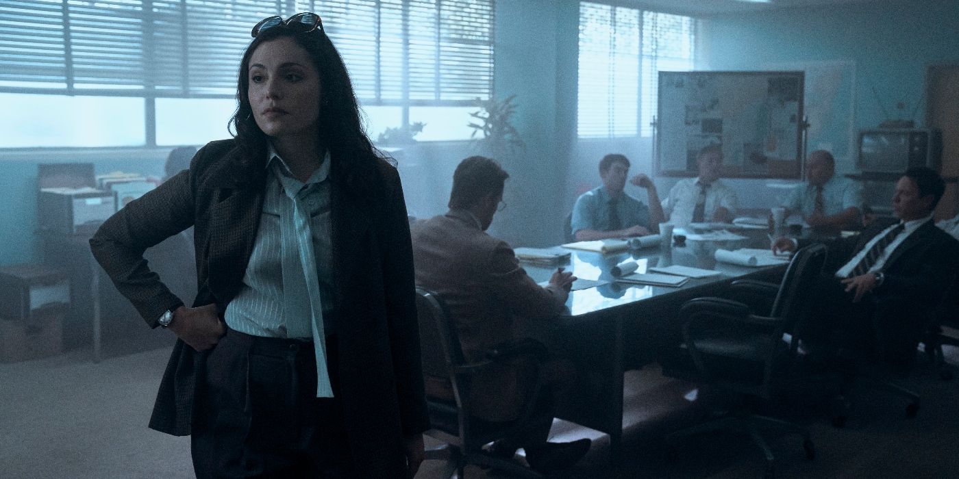 Juliana Aidén Martinez as June standing in an investigation room in Griselda