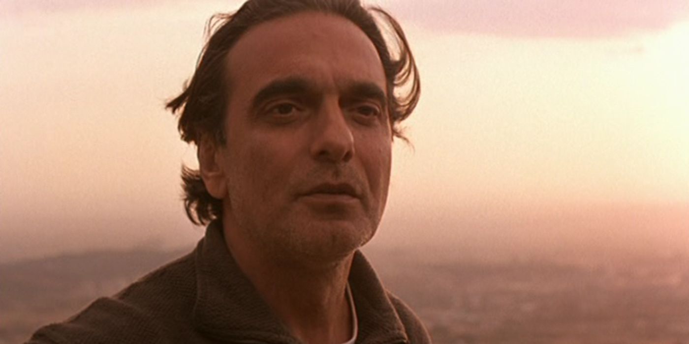 Hamayoun Ershadi as Mr. Badii looking into the distance in Taste of Cherry