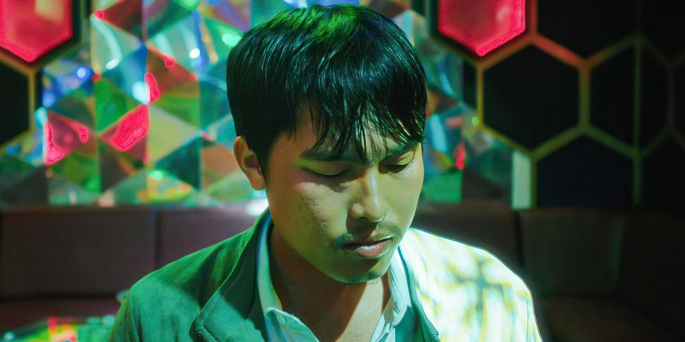Le Phong Vu as Thien singing karaoke in Inside the Yellow Cocoon Shell. 