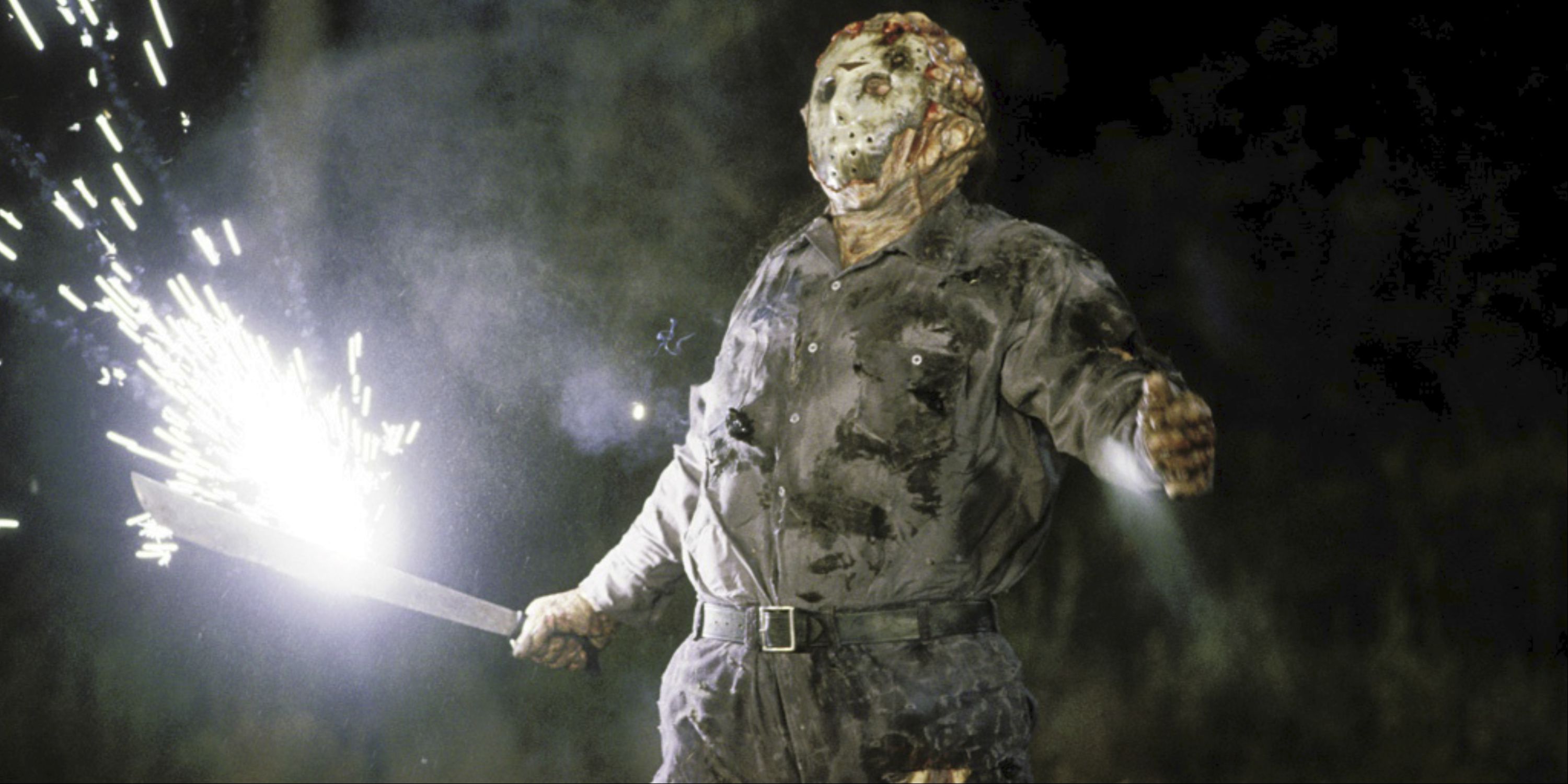 Kane Hodder as Jason holding a machete on fire in Jason Goes to Hell: The Final Friday
