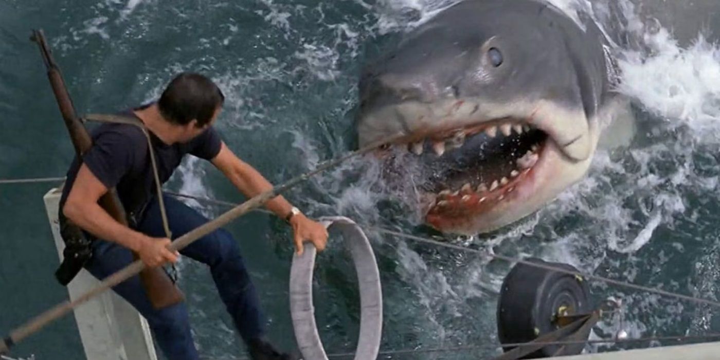 Jaws shark emerging from the sea to attack Brody (Roy Scheider) on the boat 