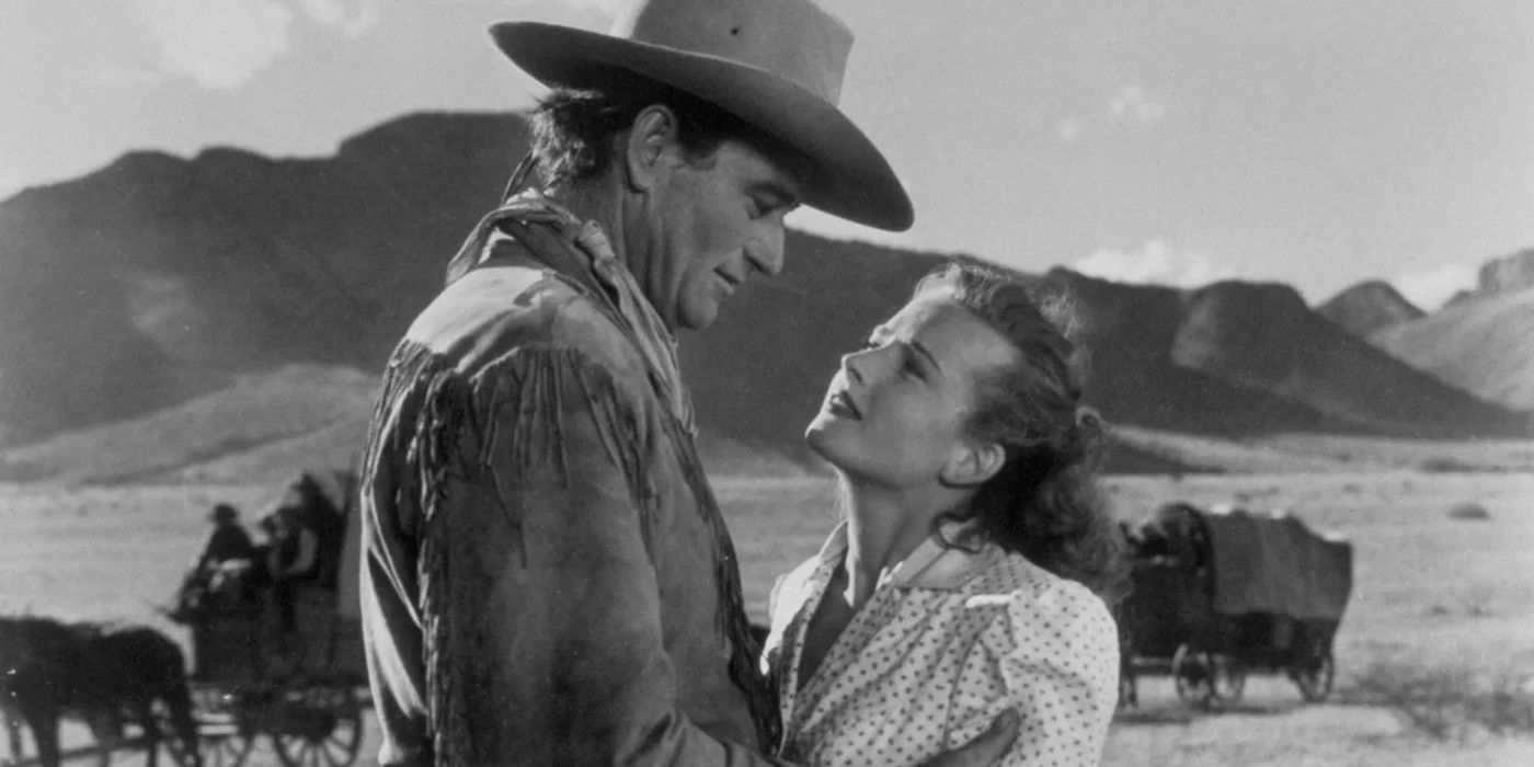 John Wayne as Thomas Dunson and Joanne Dru as Tess Millay in Red River (1948)