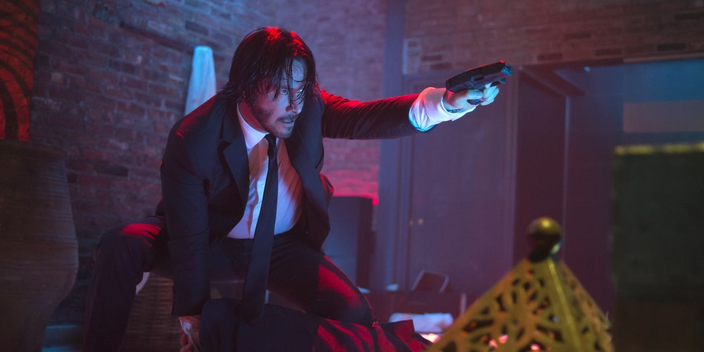 Keanu Reeves shooting a gun in John Wick