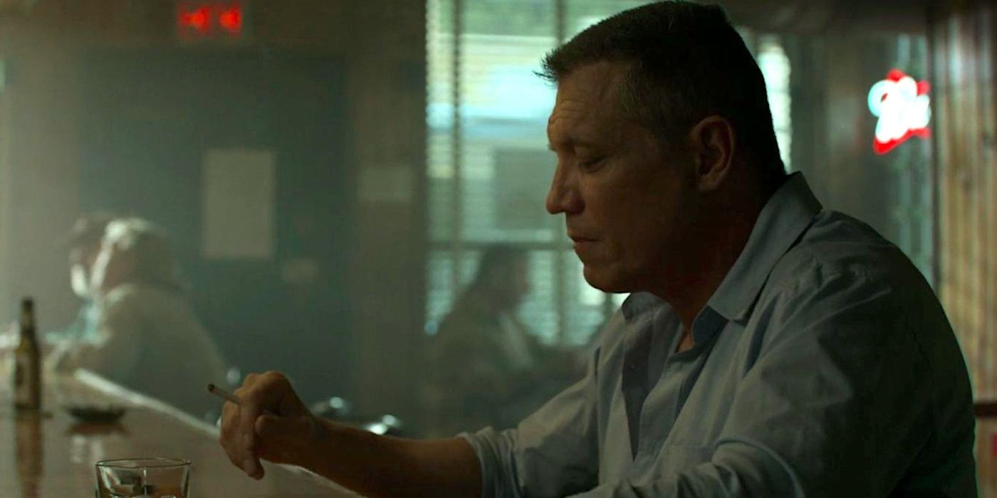 Holt McCallany as Bill Tench sitting at a bar in Mindhunter