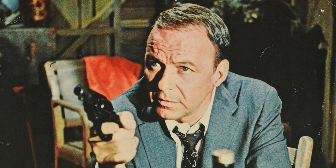 Frank Sinatra aiming a gun off-camera in Lady in Cement