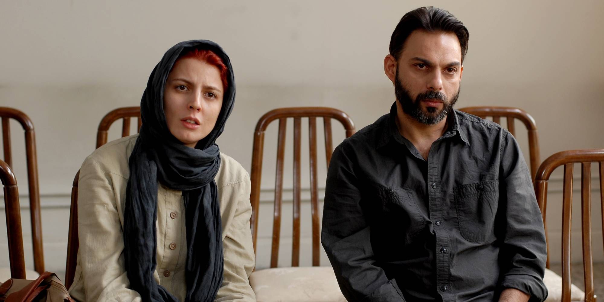 Leila Hatami and Payman Maadi sitting side by side in A Separation