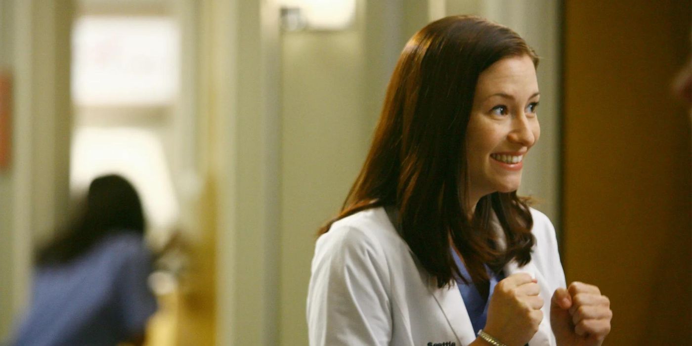 Lexie (Chyler Leigh) with her fists clenched in excitement in Grey's Anatomy