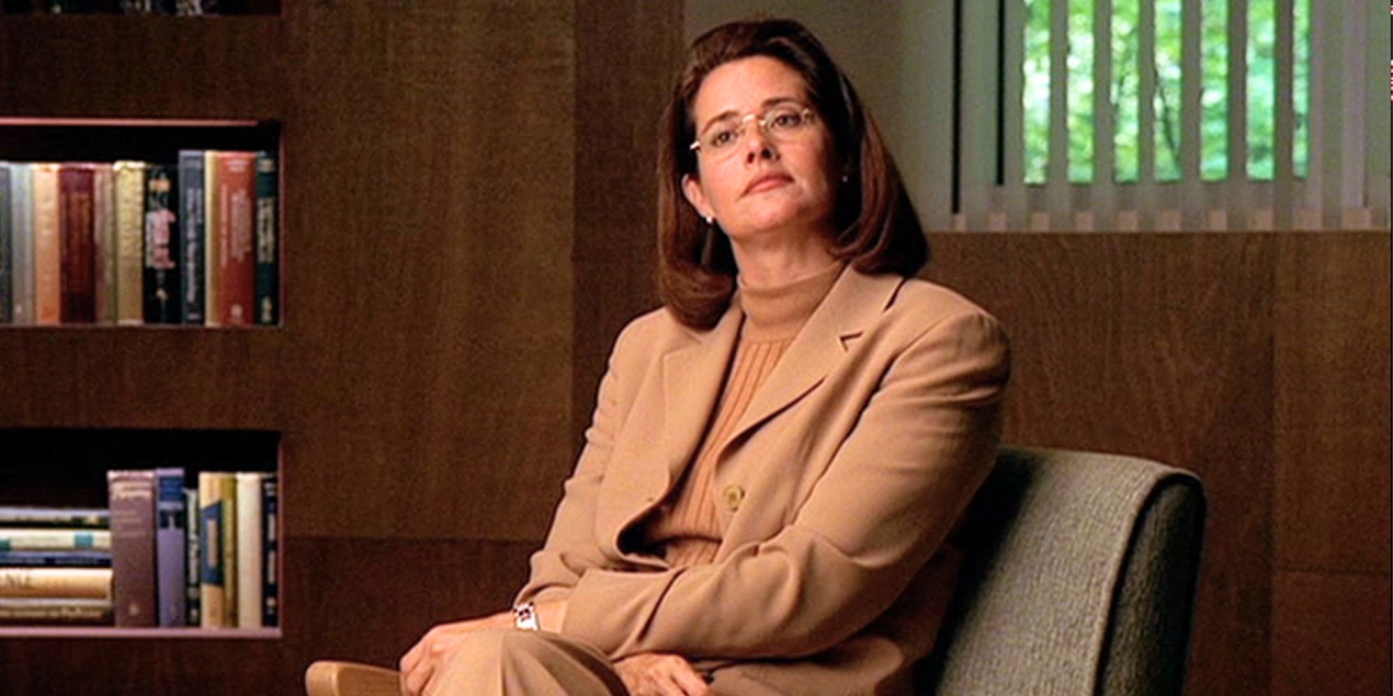 Lorraine Bracco sitting in her office in The Sopranos