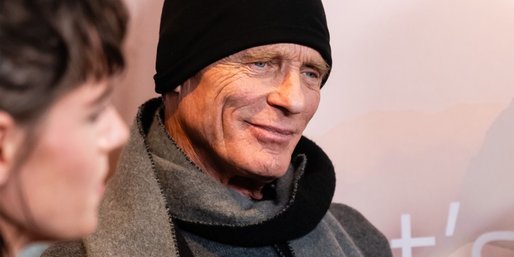 Love Lies Bleeding's Ed Harris smiling during an interview at Sundance 2024