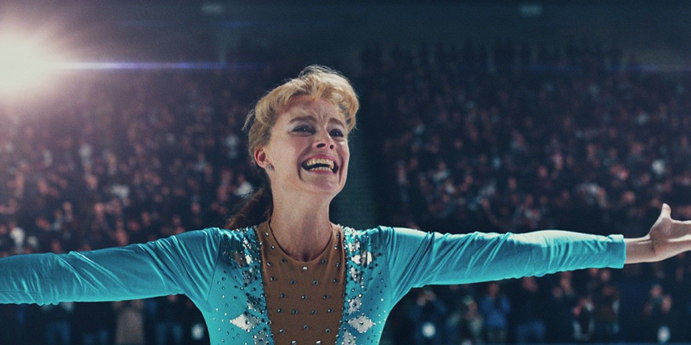 Tonya Harding (Margot Robbie) takes in the applause in 'I, Tonya' with her arms opened and smiling.