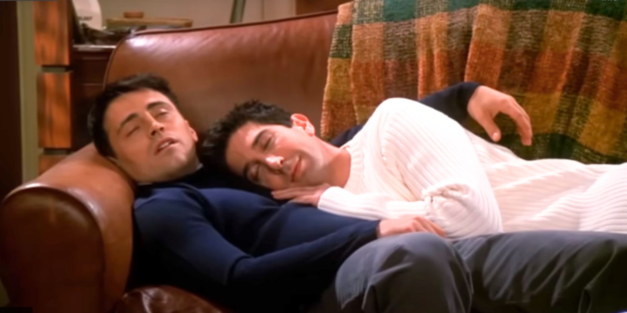 Matt LeBlanc and David Schwimmer taking a nap on a couch in Friends