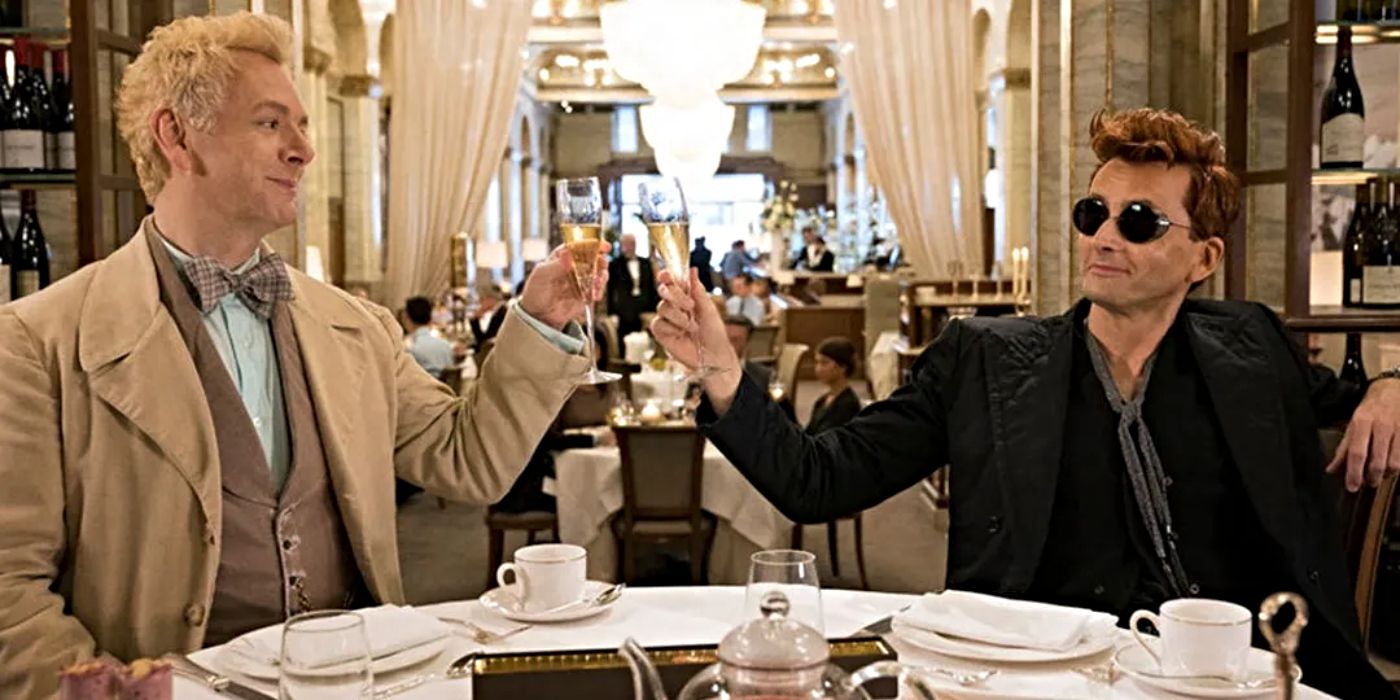 Michael Sheen as Aziraphale and David Tennent as Crowley cheersing in Good Omens