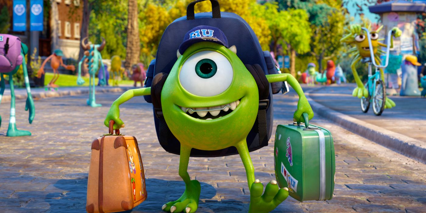 A young Mike Wazowski looks excited as he arrives at Monsters University with his bags.
