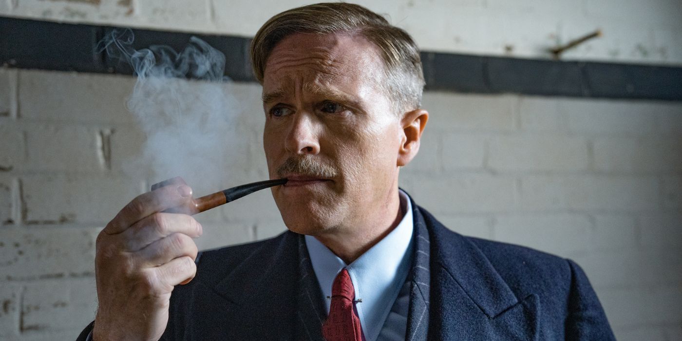 Cary Elwes smoking a pipe in The Ministry of Ungentlemanly Warfare