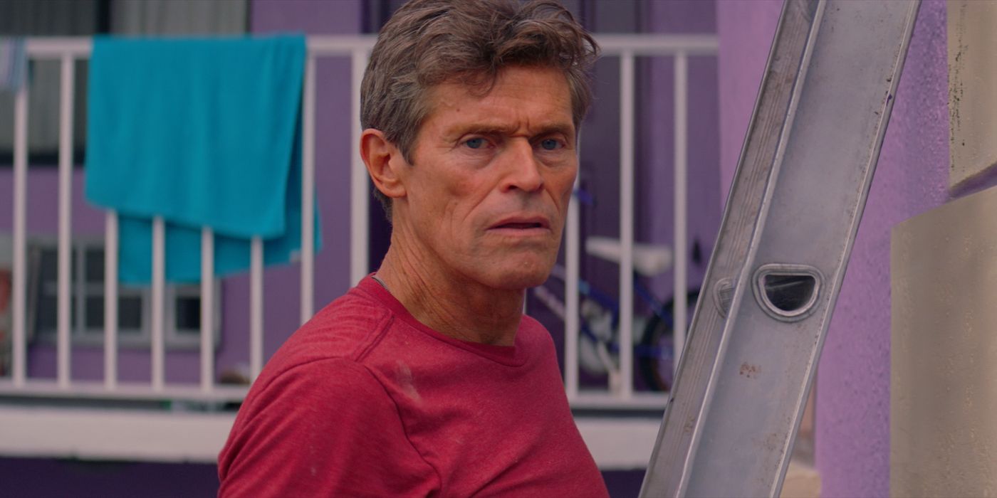 Willem Dafoe as Bobby Hicks using a ladder in The Florida Project