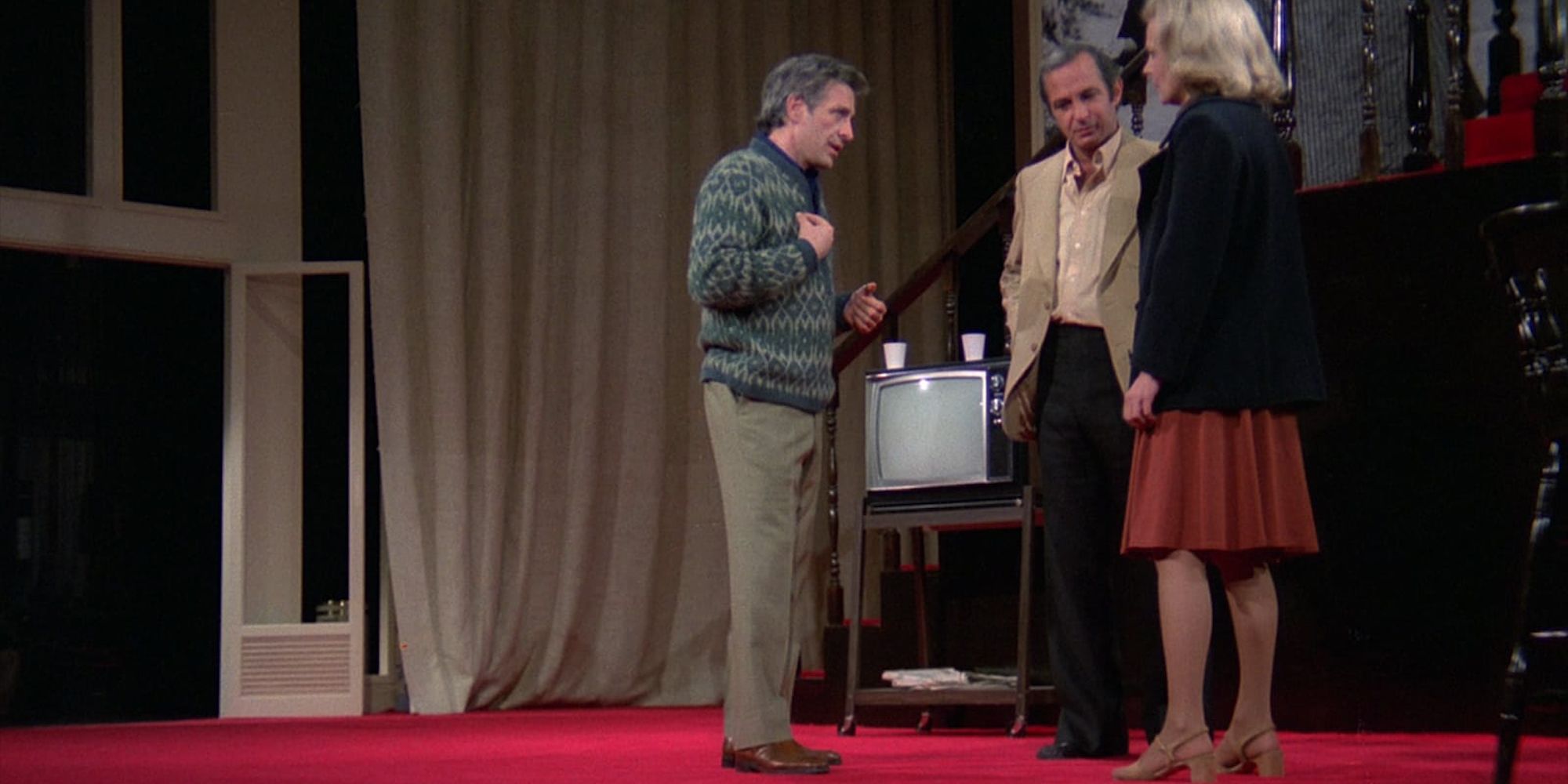Gena Rowlands, John Cassavetes, and Ben Gazzara as Myrtle, Maurice, and Manny, standing and talking in Opening Night