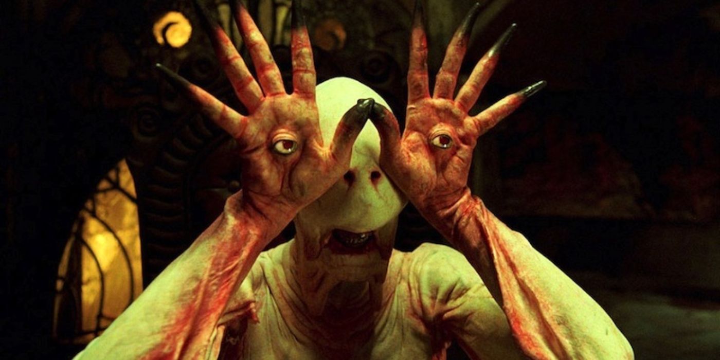 The pale man glares with its eyes in the palms of its hands in Pan's Labyrinth.