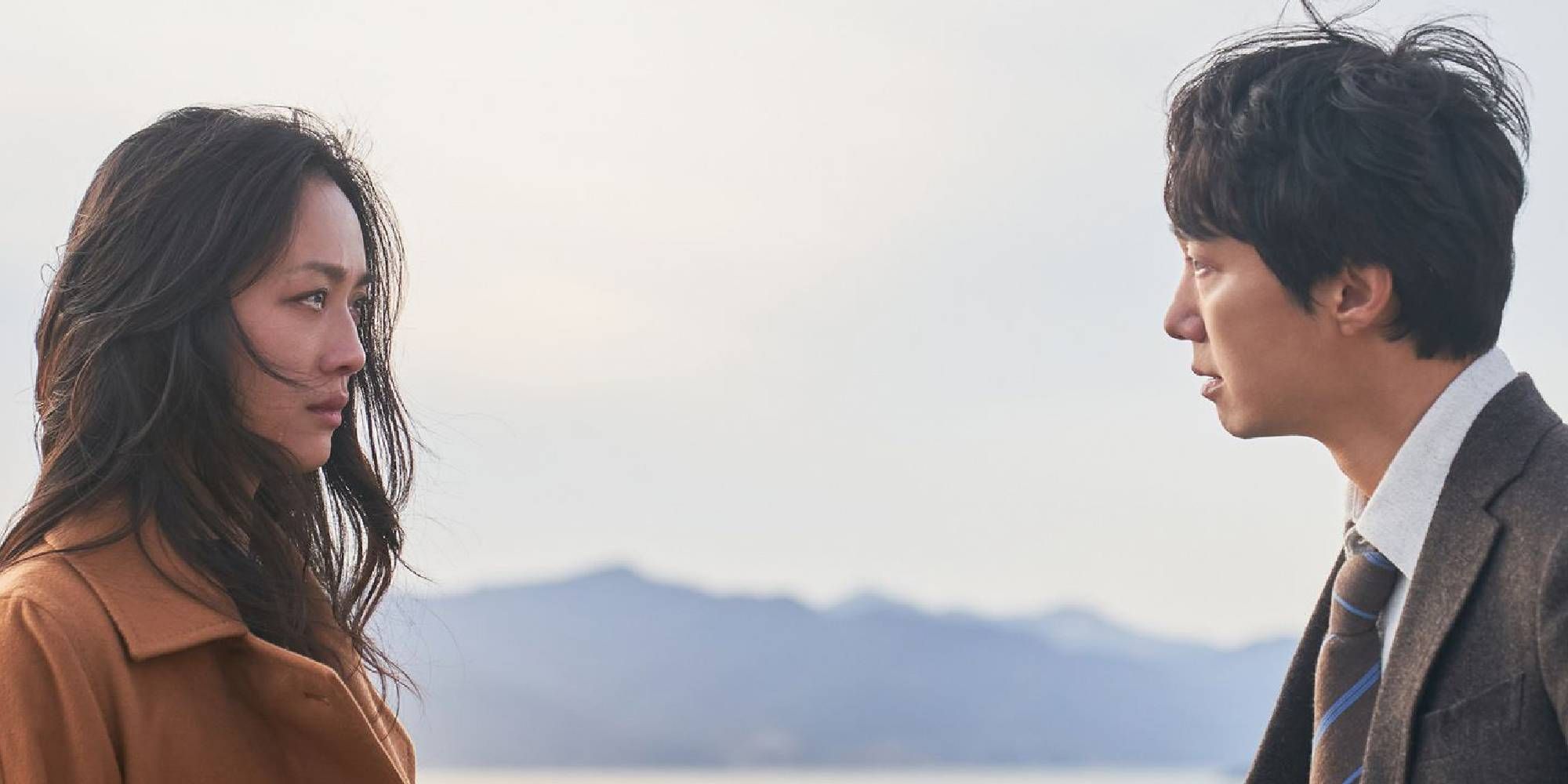 Park Hae-il si Tang Wei se uita unul la altul in „Decizia de a pleca”