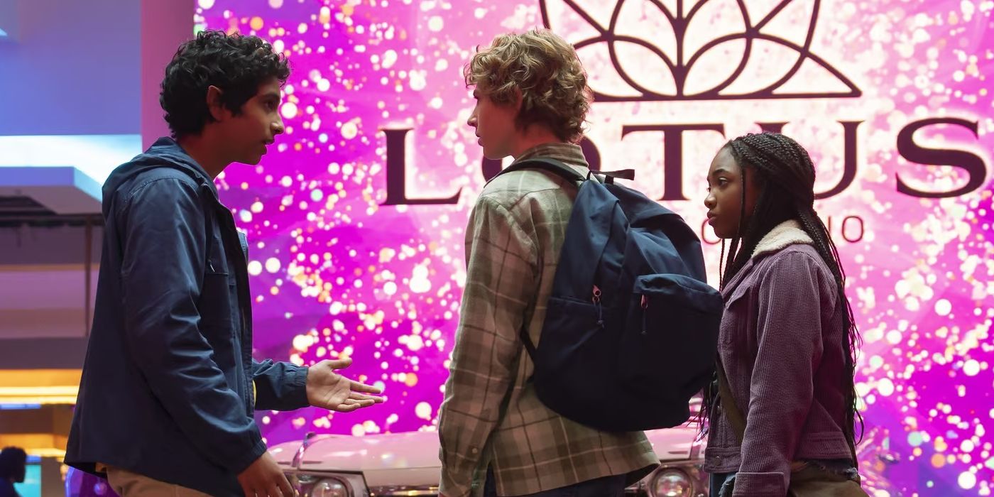 Annabeth (Leah Jeffries), Percy (Walker Scobell), and Grover (Aryan Simhadri) standing in front of a Lotus Hotel sign in 'Percy Jackson and the Olympians'