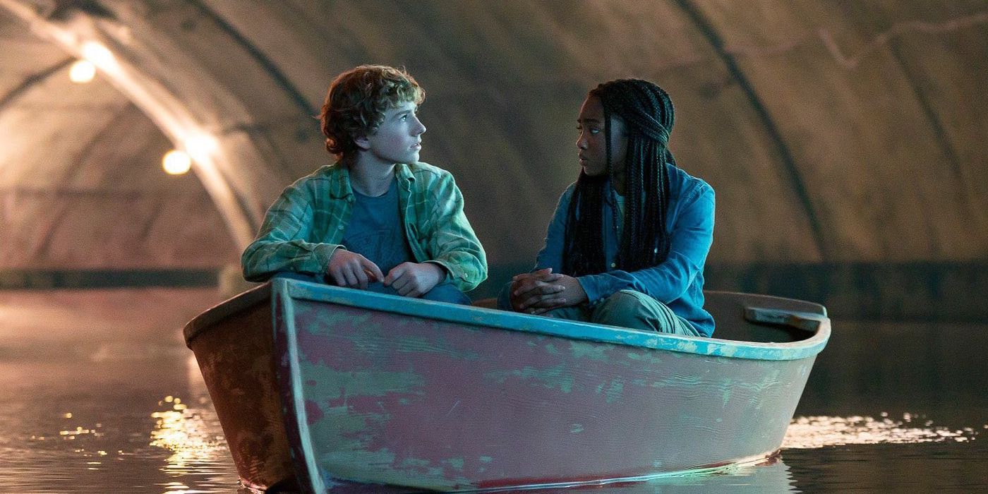 Percy (Walker Scobell) &amp; Annabeth (Leah Jeffries) riding a boat through a tunnel in &lsquo;Percy Jackson and the Olympians&rsquo;