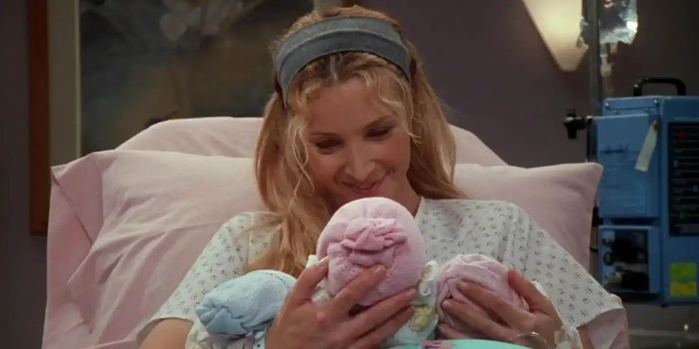Lisa Kudrow as Phoebe holding triplets in a hospital bed in Friends