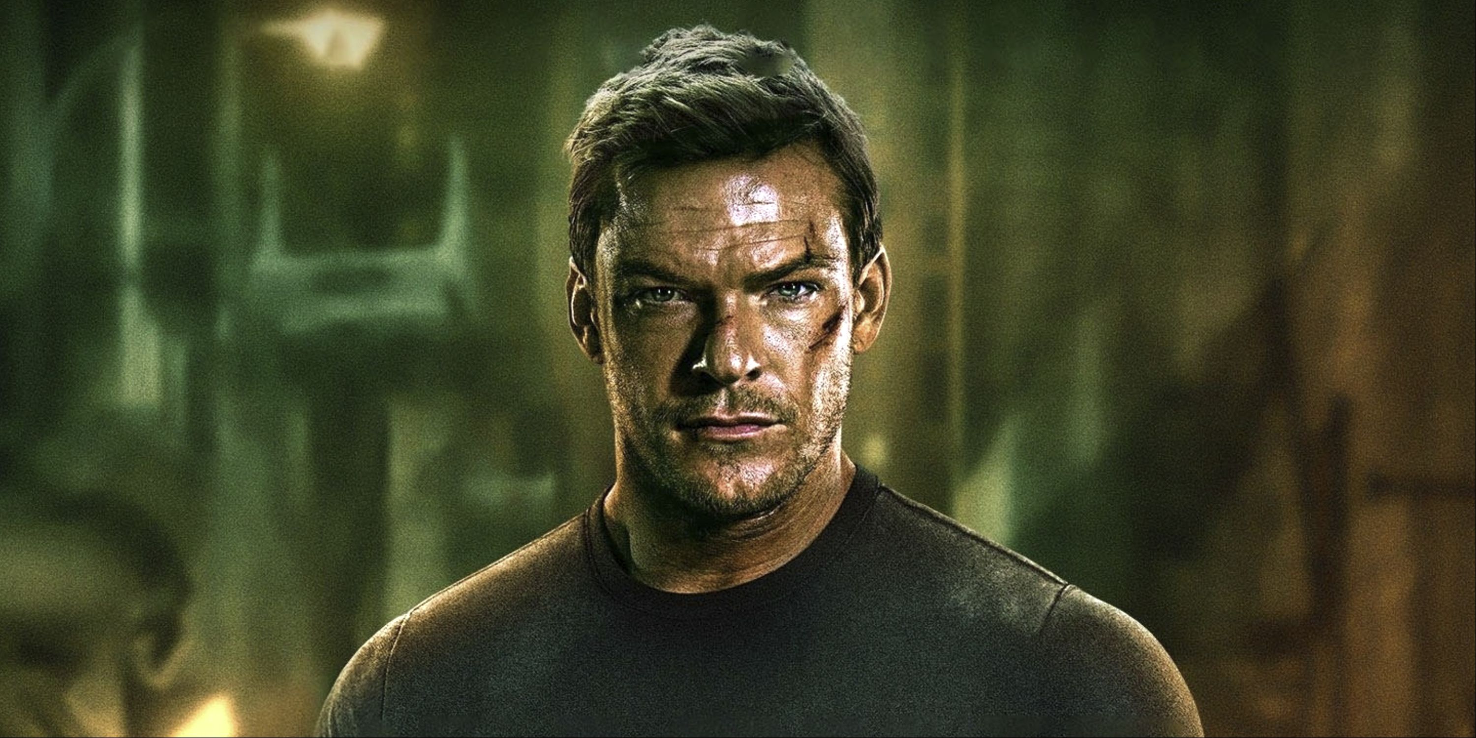 Alan Ritchson as Jack Reacher looking menacing with cuts on his face