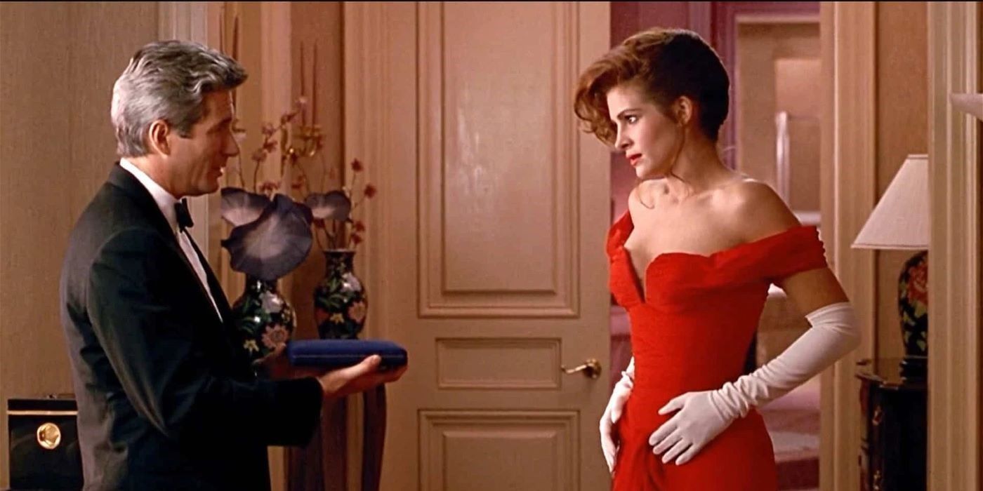Edward holding out a jewelry box to Vivian in Pretty Woman