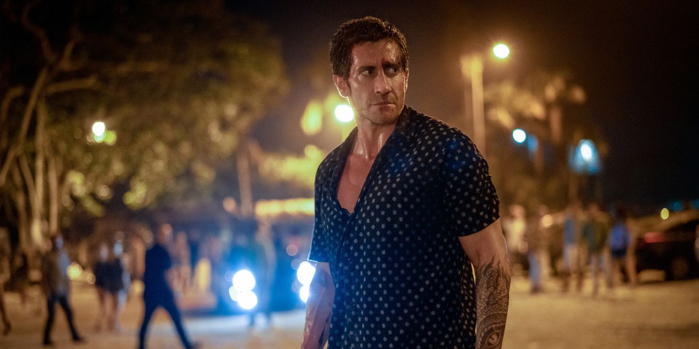 Jake Gyllenhaal as Elwood Dalton, sweating, with his shirt half unbuttoned, in Road House