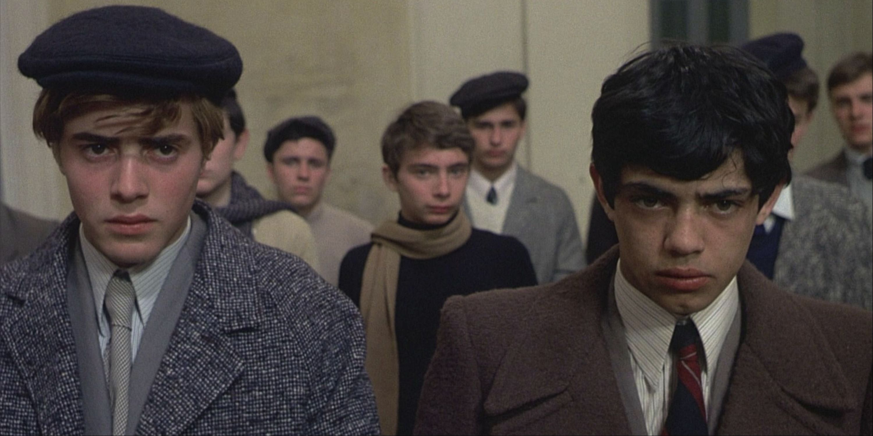 Boys standing around looking serious in Salò