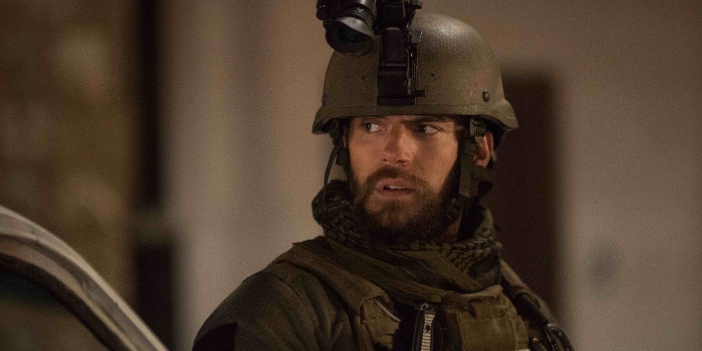 Henry Cavill as Captain Syverson, wearing army gear and looking serious in Sand Castle