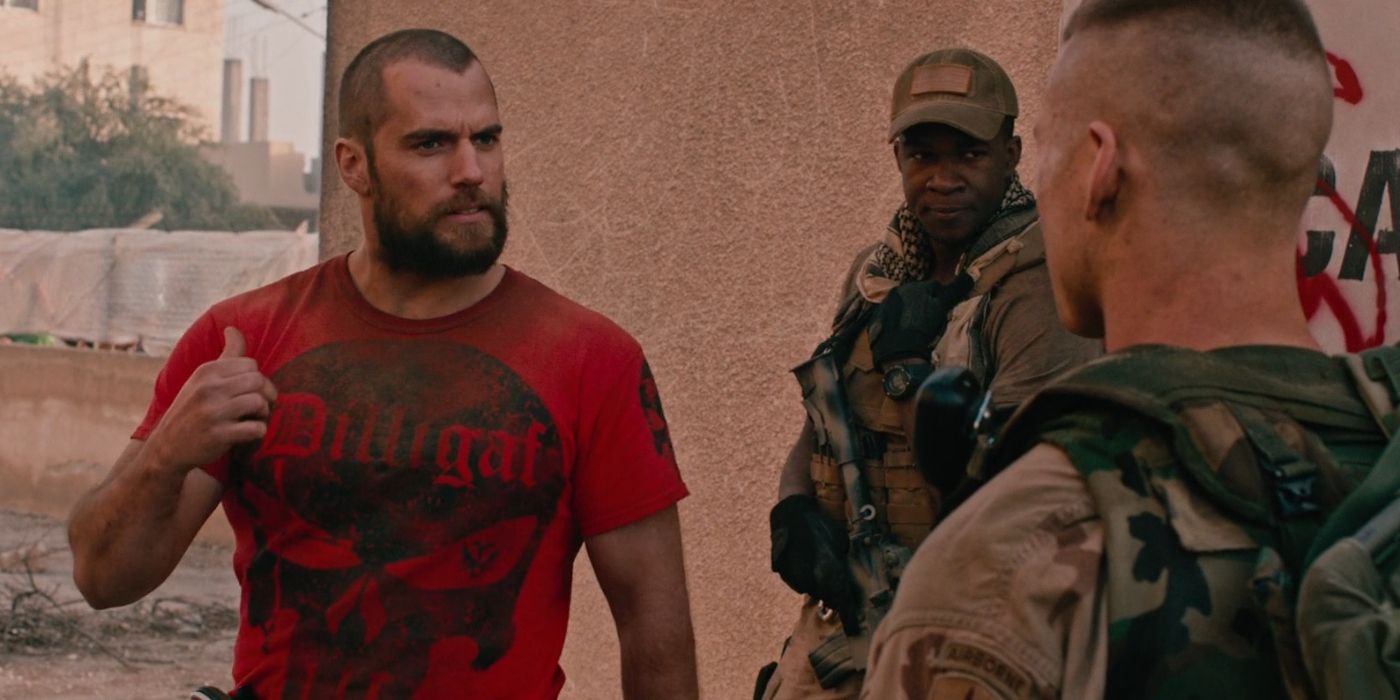 Henry Cavill as Captain Syverson, talking to soldiers in Sand Castle