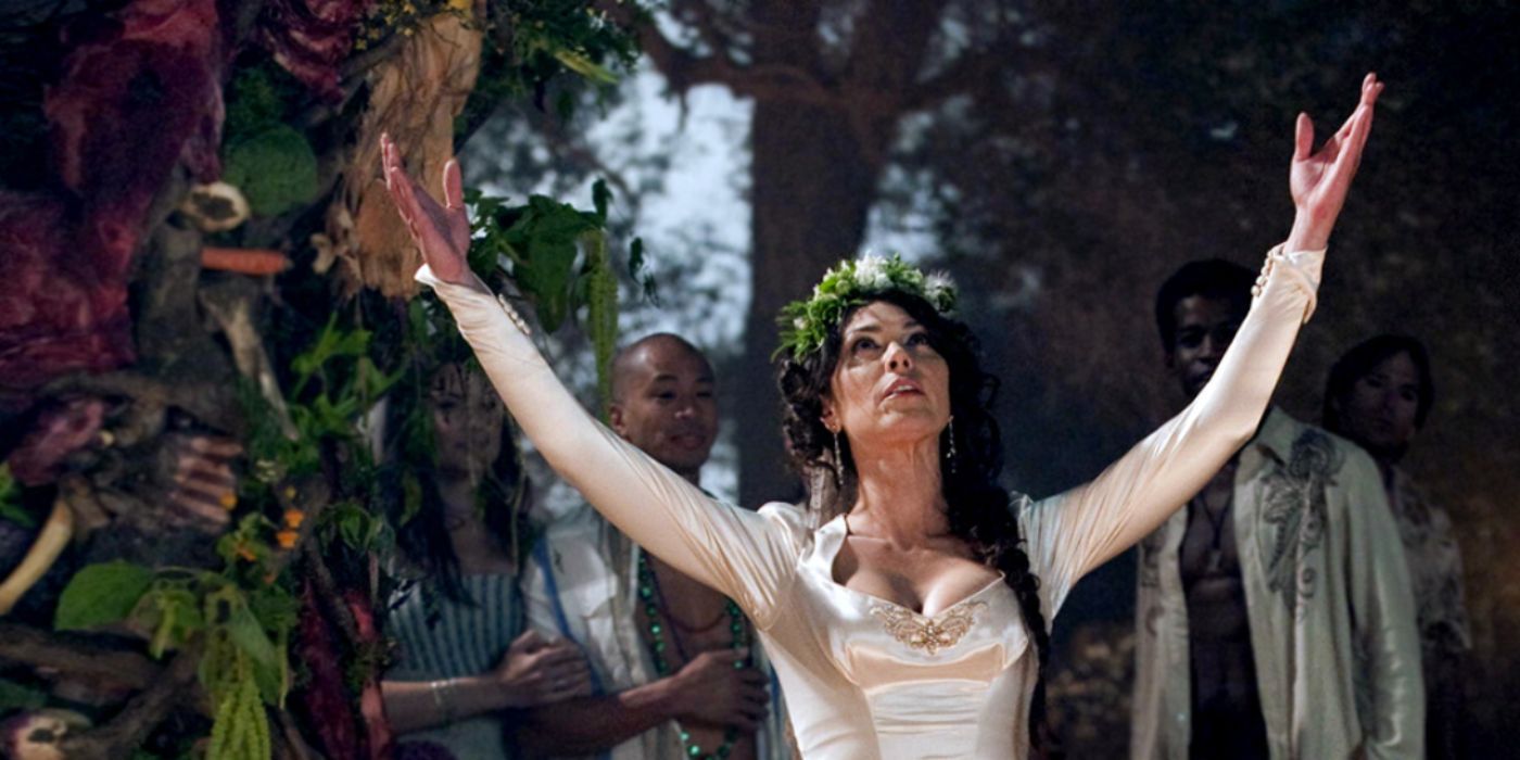 Michelle Forbes as Maryann Forster wearing white in the woods in 'True Blood'