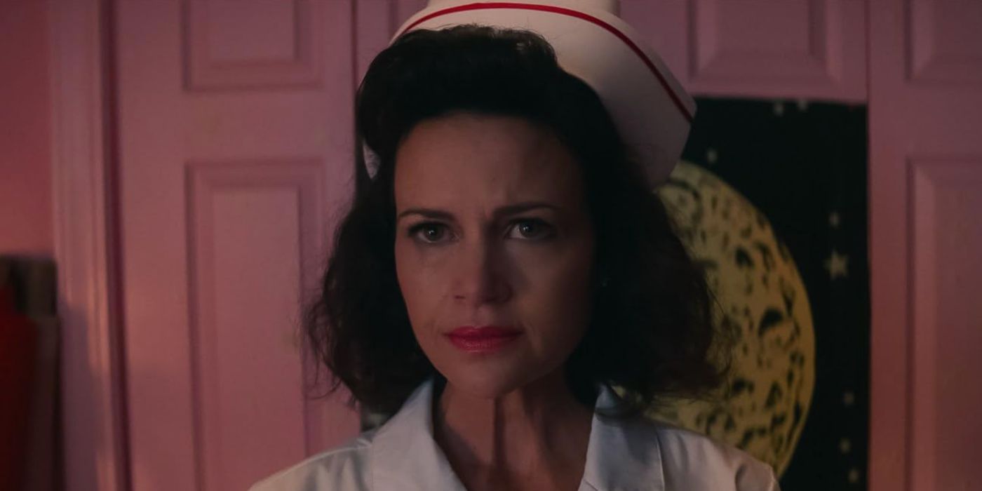Carla Gugino as Janet in a nurse's uniform in 'Lisa Frankenstein'