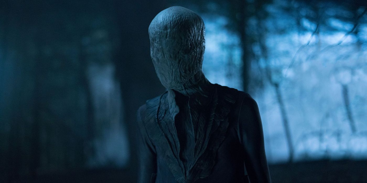 Slenderman standing in the forest in the film Slenderman