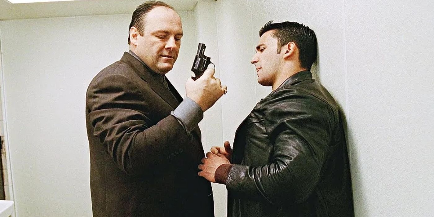 Jason Cerbone and James Gandolfini holding a gun in The Sopranos