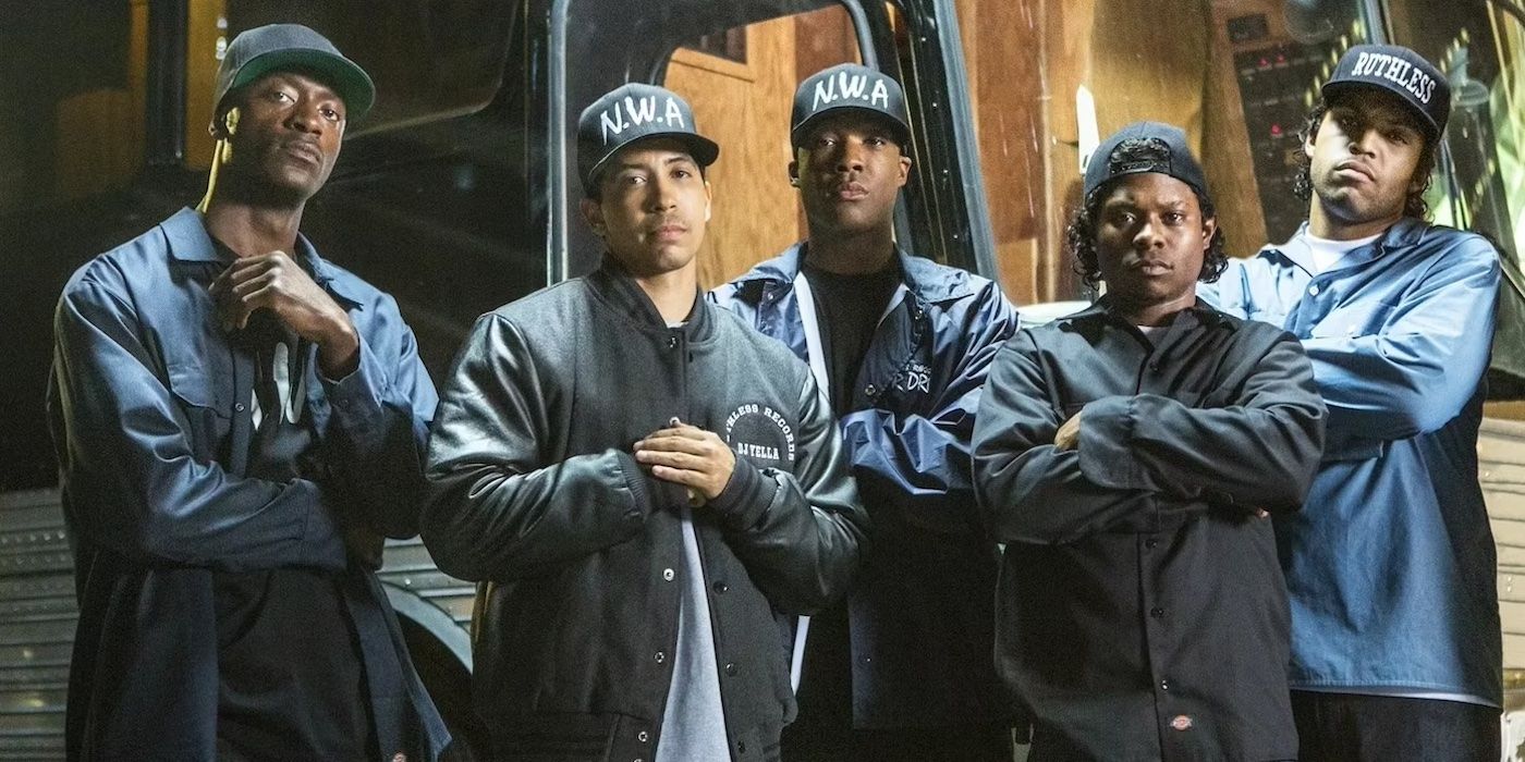 Cast of Straight Outta Compton (2015) posing with N.W.A hats on