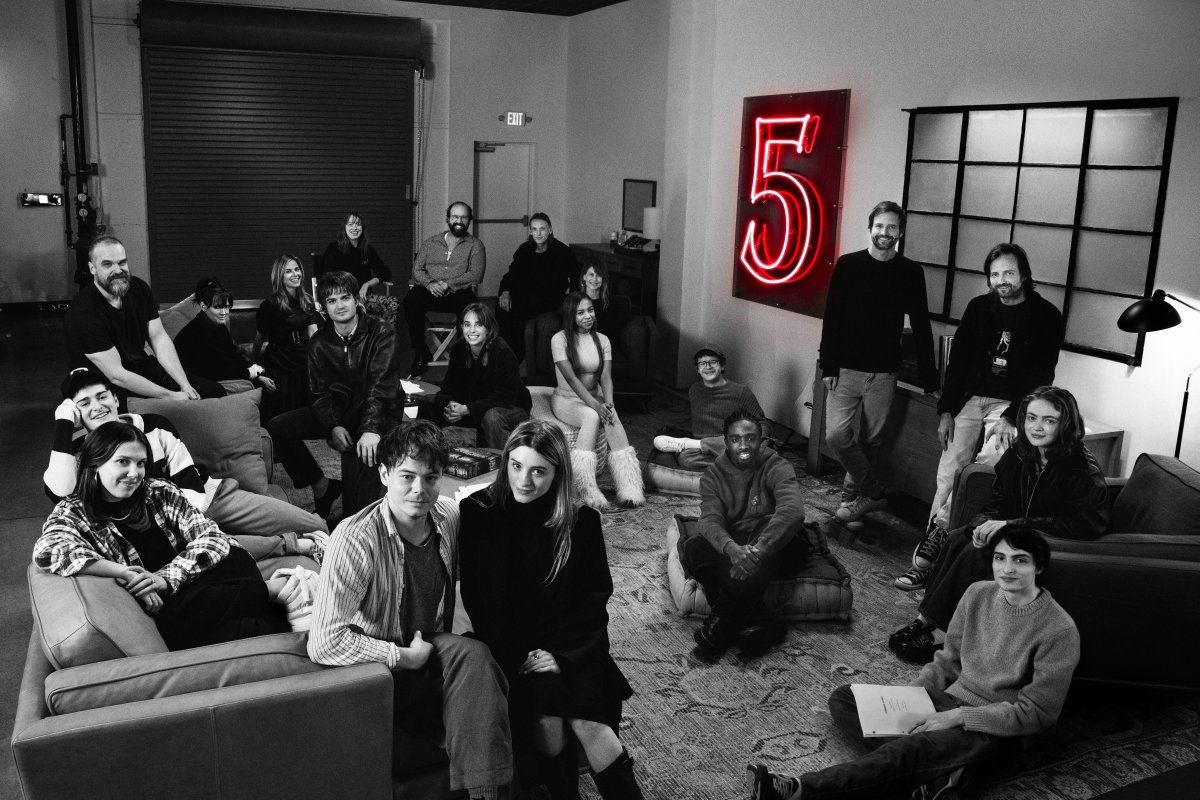 a black and white photo of the ensemble cast of Stranger Things Season 5
