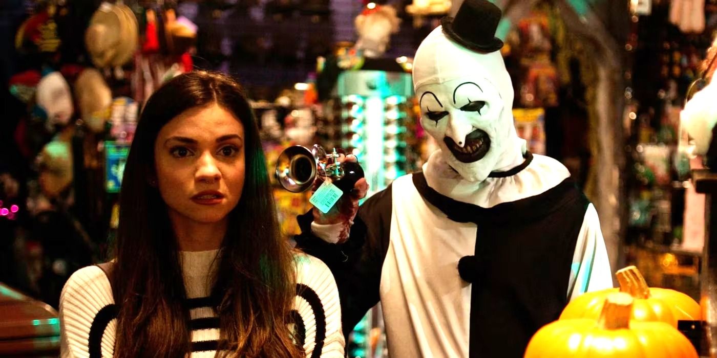 David Howard Thornton as Art the Clown tormenting Lauren LaVera as Sienna in a prop store in Terrifier 2