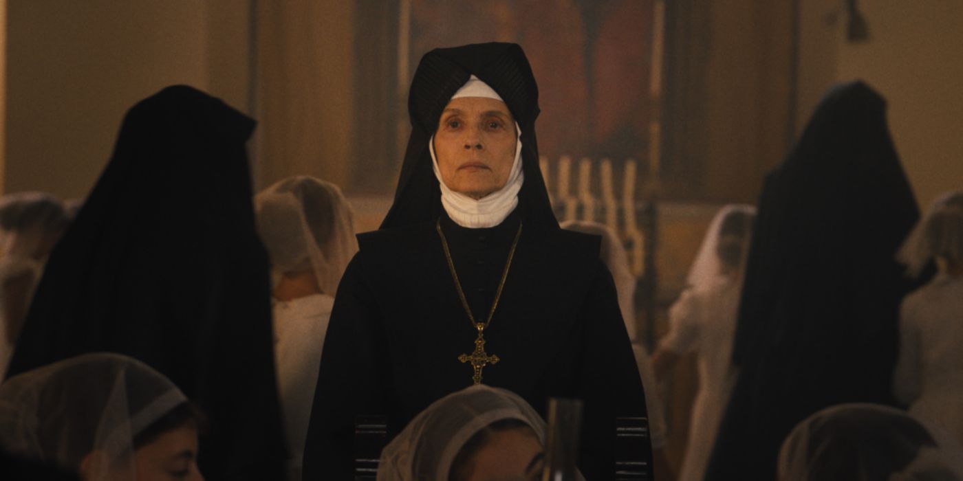 Sonia Braga as Silva, a nun dressed in black and white, staring at a person offscreen in The First Omen