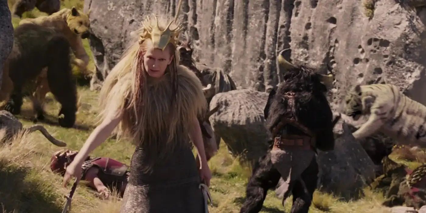 Jadis the White Witch, dressed in a lion-mane outfit, battling the army of Peter.