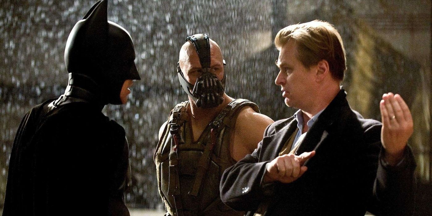 Christian Bale, Tom Hardy, and Christopher Nolan on the set of The Dark Knight Rises