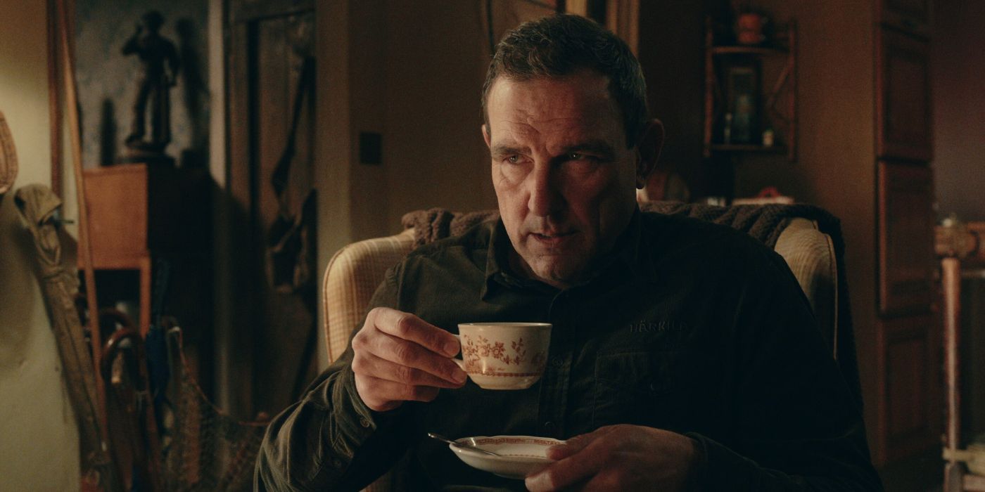 Vinnie Jones as Geoff Seacombe, drinking tea, in The Gentlemen