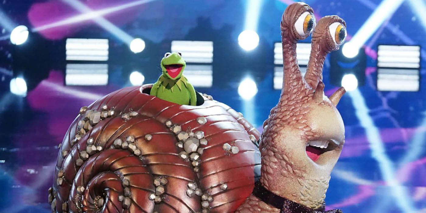 Kermit the Frog in a snail costume in a scene from The Masked Singer.