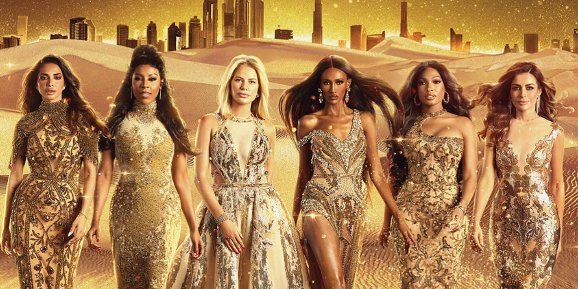 Six women in gold dresses walking in the desert in The Real Housewives of Dubai