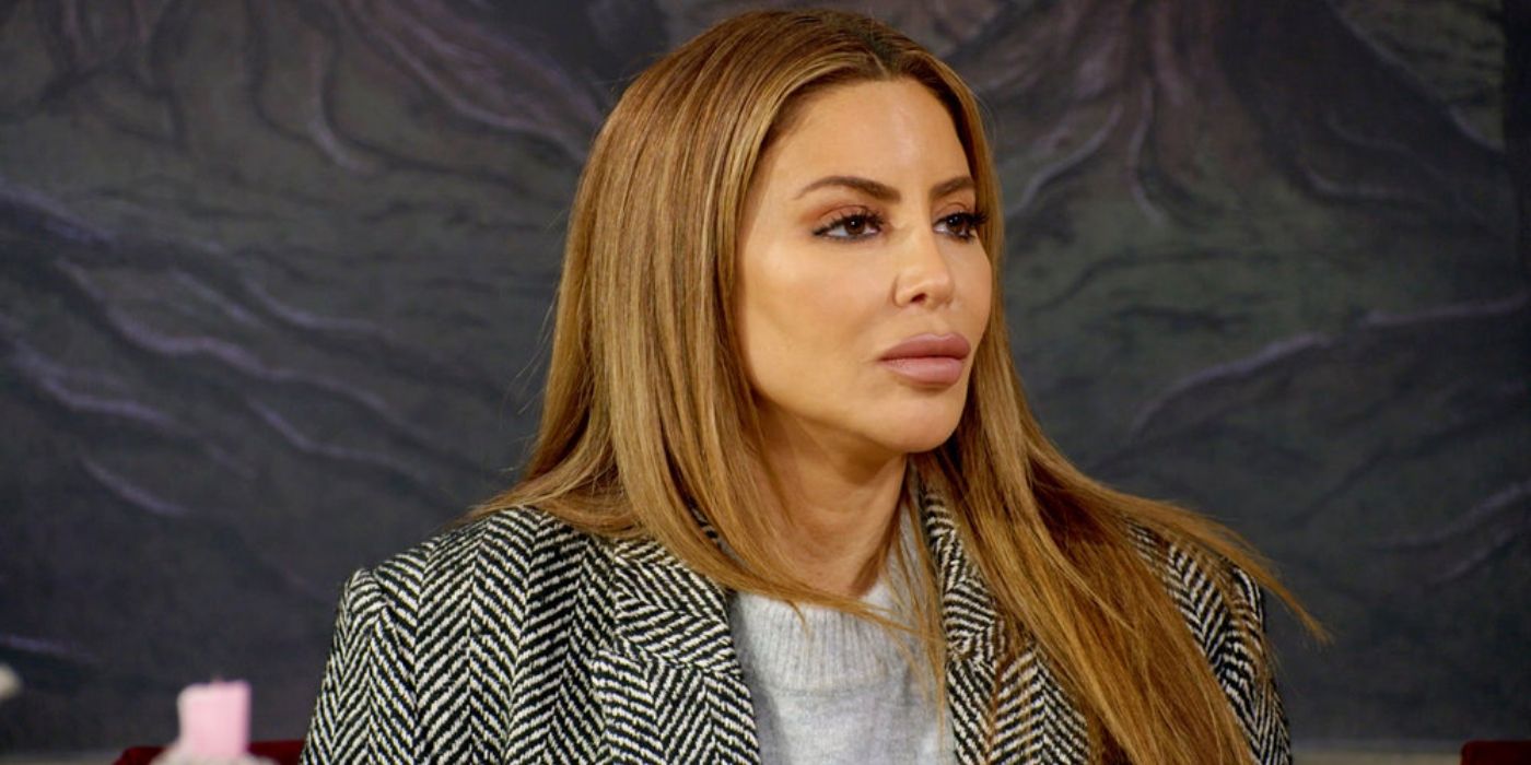  Larsa Pippen sits in a white sweater and blazer on 'The Traitors'