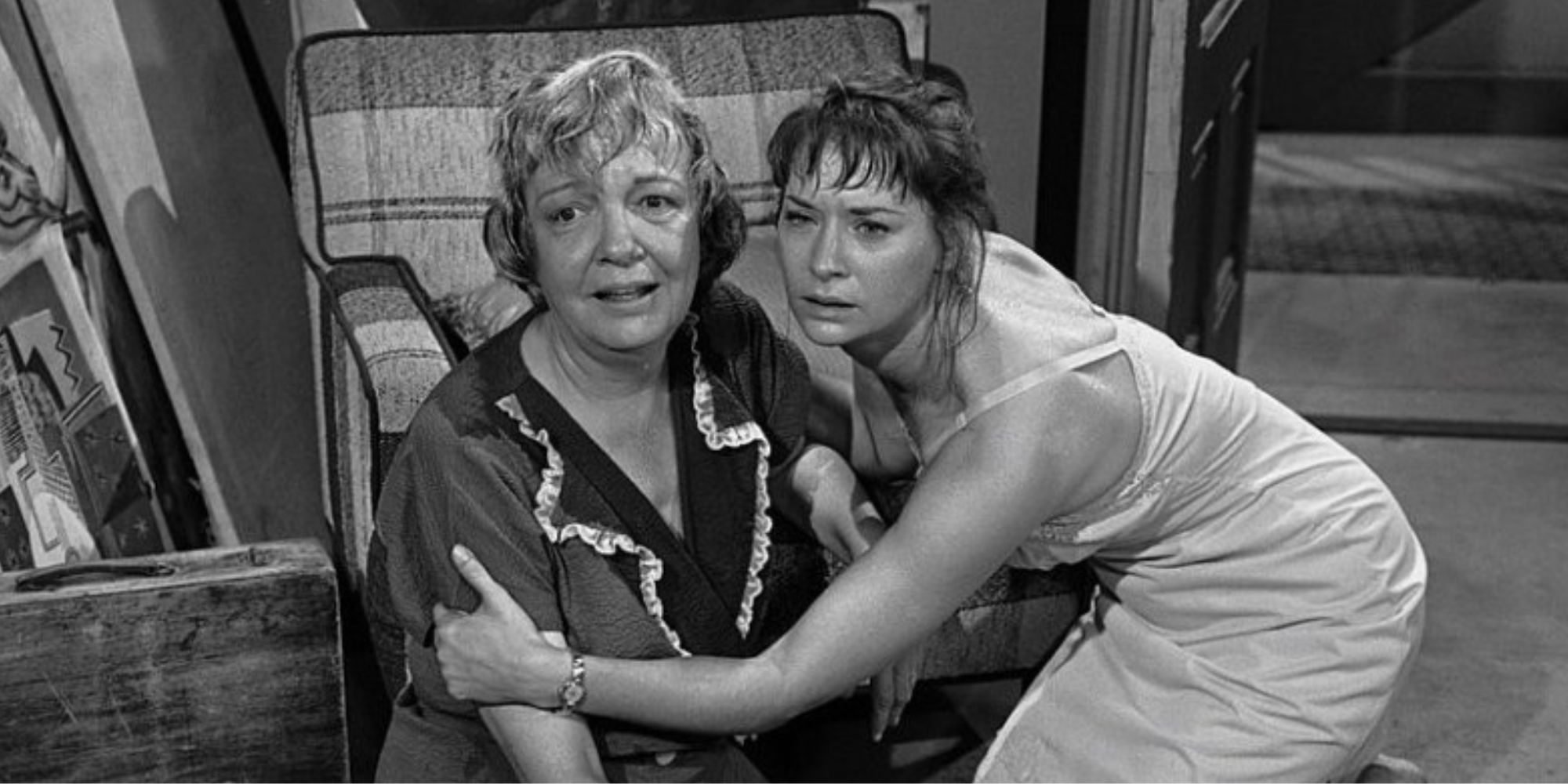 Lois Nettleton and Betty Garde sitting on the floor in The Twilight Zone