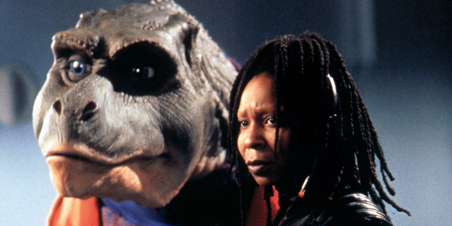 Whoopi Goldberg next to her talking dinosaur partner in Theodore Rex