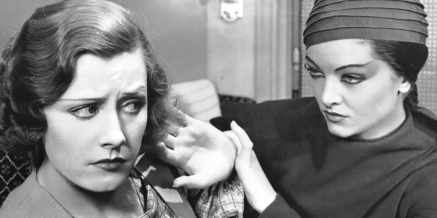 Peg Entwistle as Hazel and Myrna Loy as Ursula in Thirteen Women (1932)