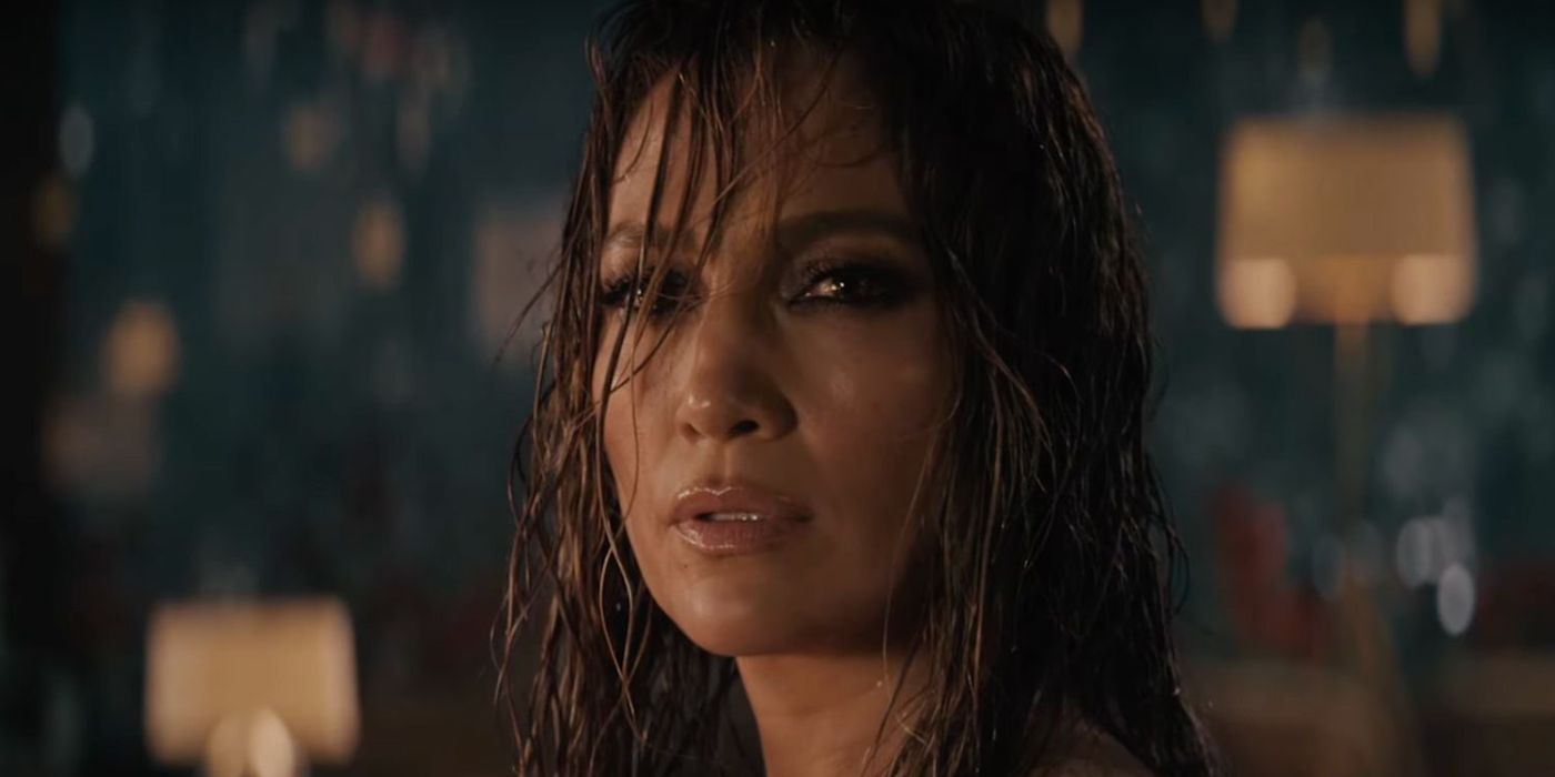 Jennifer Lopez standing in the rain staring ahead in This Is Me...Now